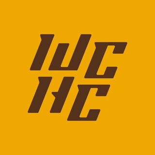 WCHC logo in gold with dark brown lettering